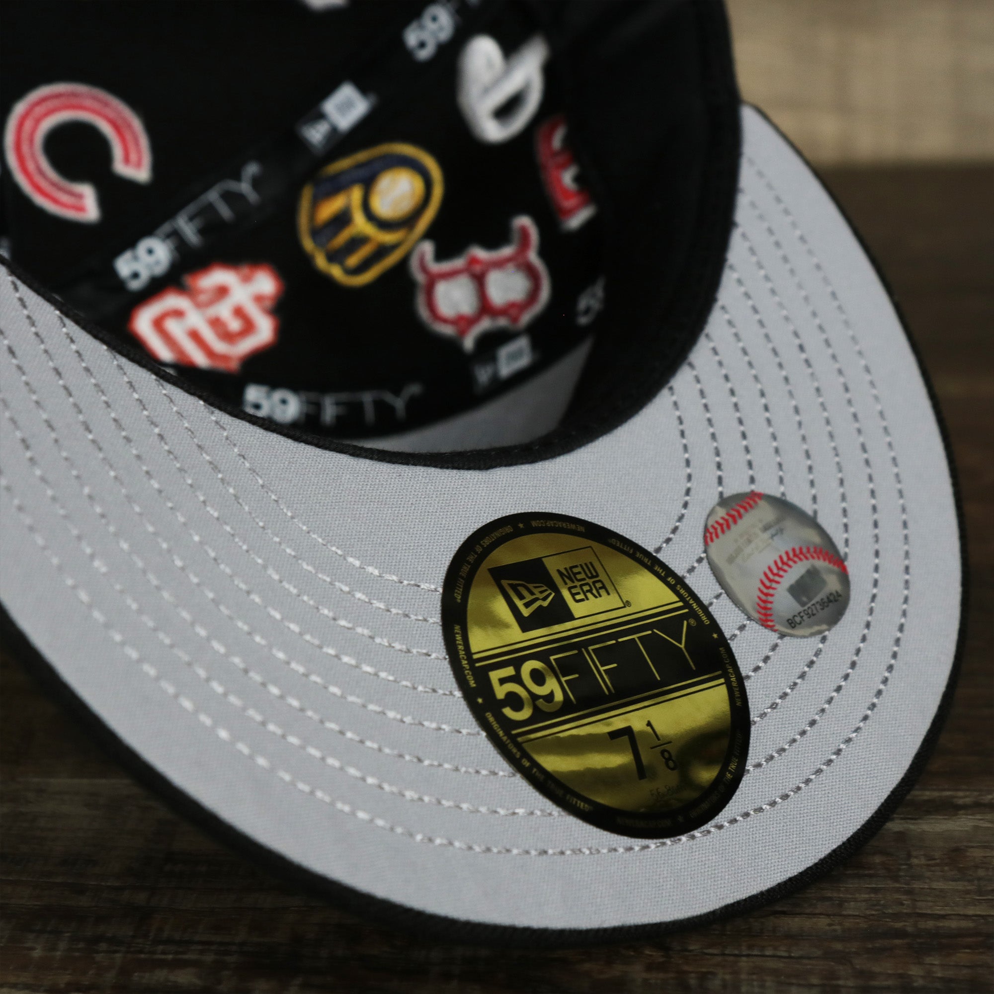 MLB Logo All Over patch fitted 59Fifty Cap with Gray Bottom | Black